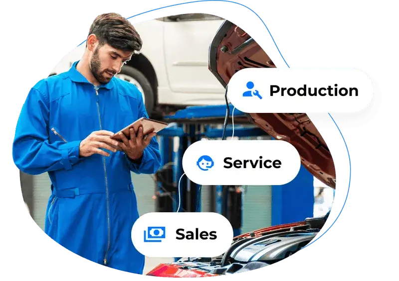 A man looking at a diagnostic tablet, repairing a car