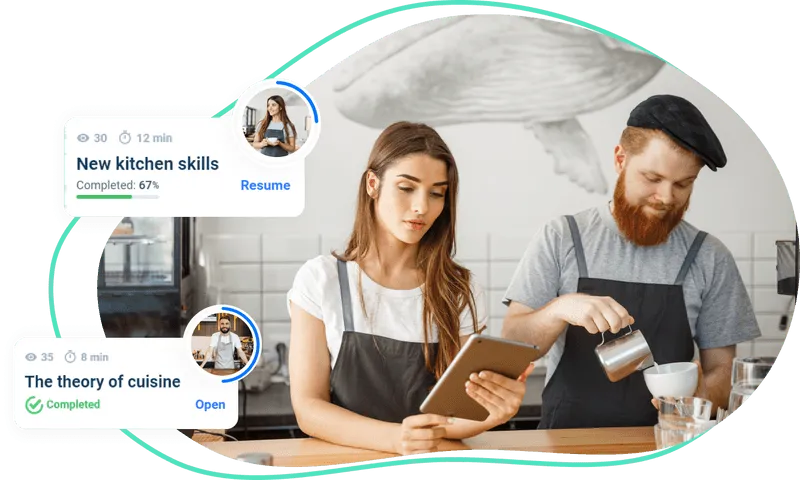 Workers in a coffee shop look at learning courses to improve knowledge right during work